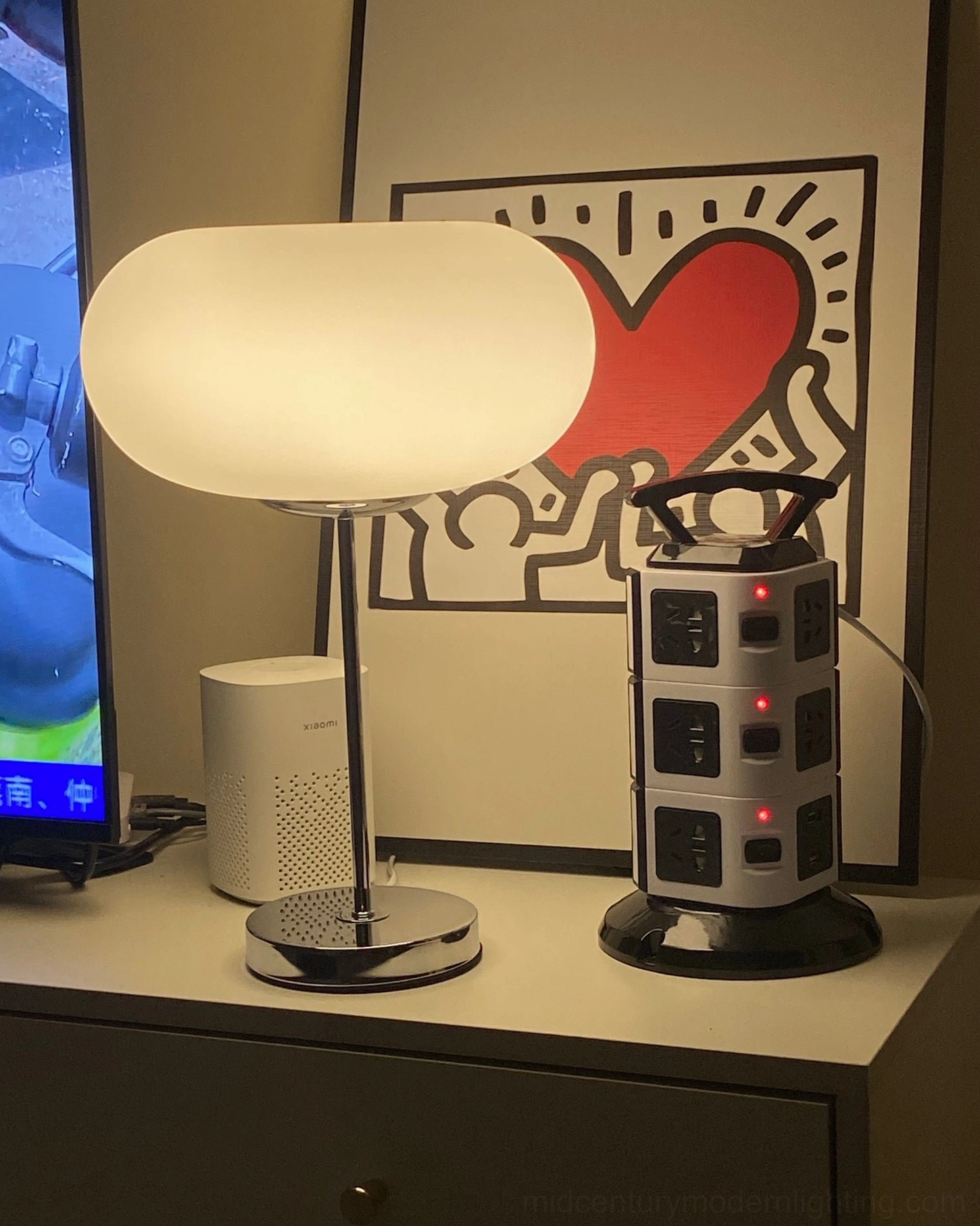 Minimalist table lamp with polished chrome finish, Scandinavian modern interior design