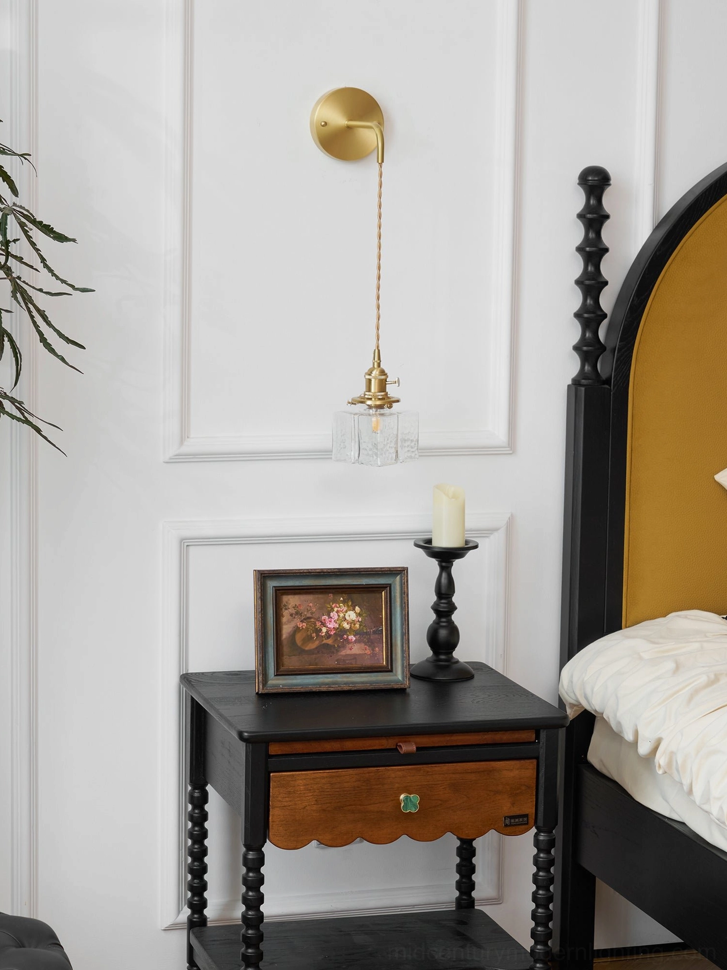 Minimalist vintage brass pendant wall lamp with tiny textured glass on empty bedroom wall