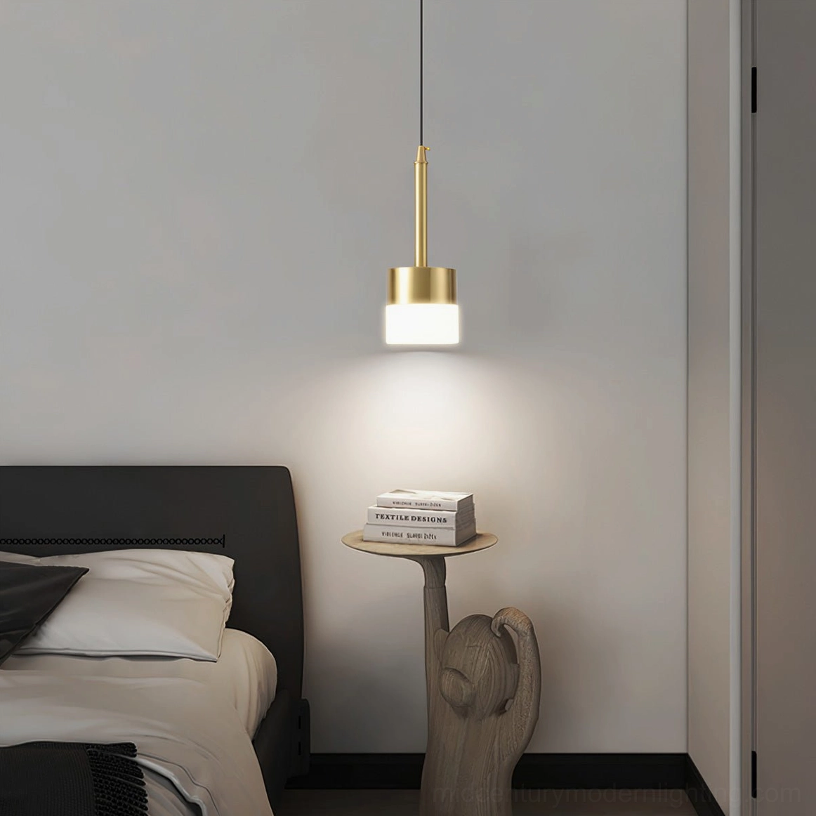Mira two-tone pendant lamp with black and brass gold finish in luxury bedroom bedside setting