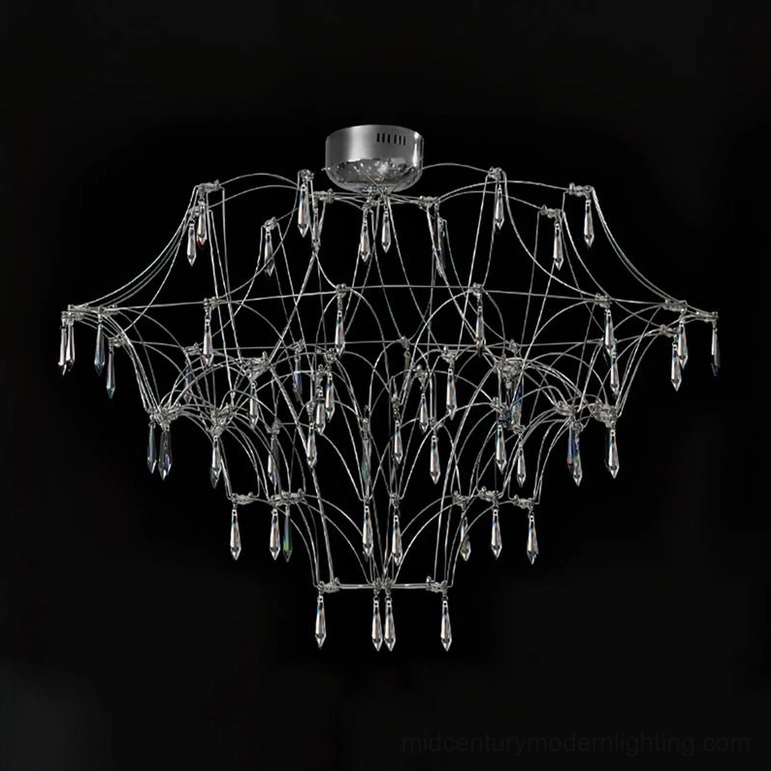 Mira crystal chandelier artistic composition showing light refraction through cascading crystal droplets and metal framework