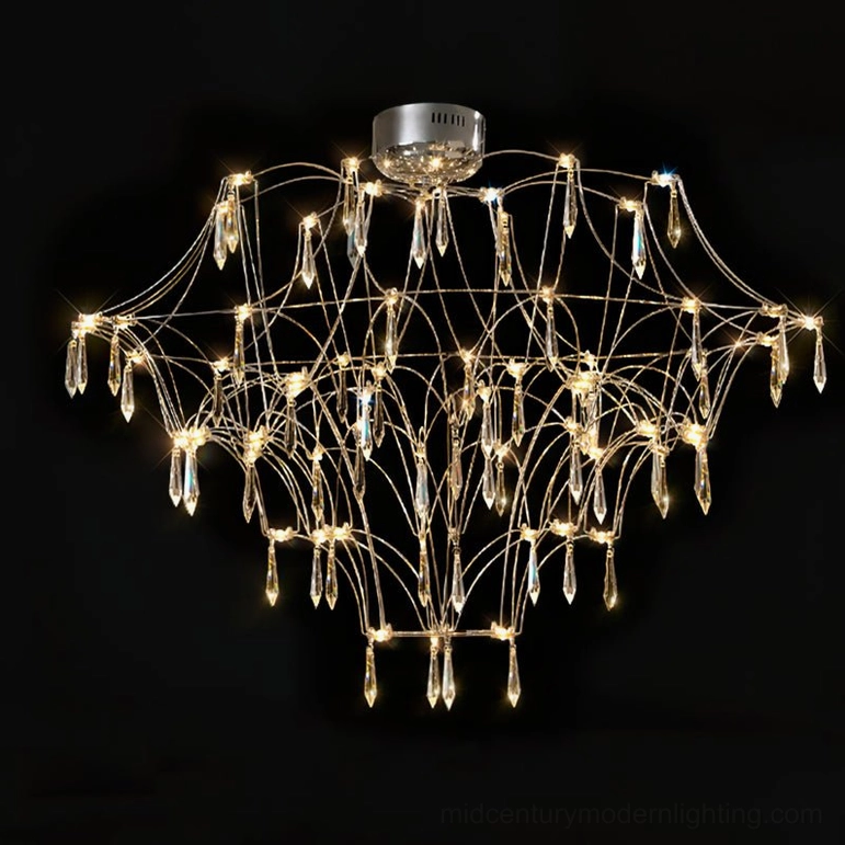 Mira tiered crystal chandelier with warm glowing lights and cascading crystal pendants, front oblique view on black background