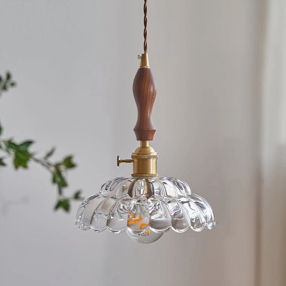 Clear fluted glass Misisco pendant lamp with walnut wood accent and brass socket in modern home lighting application