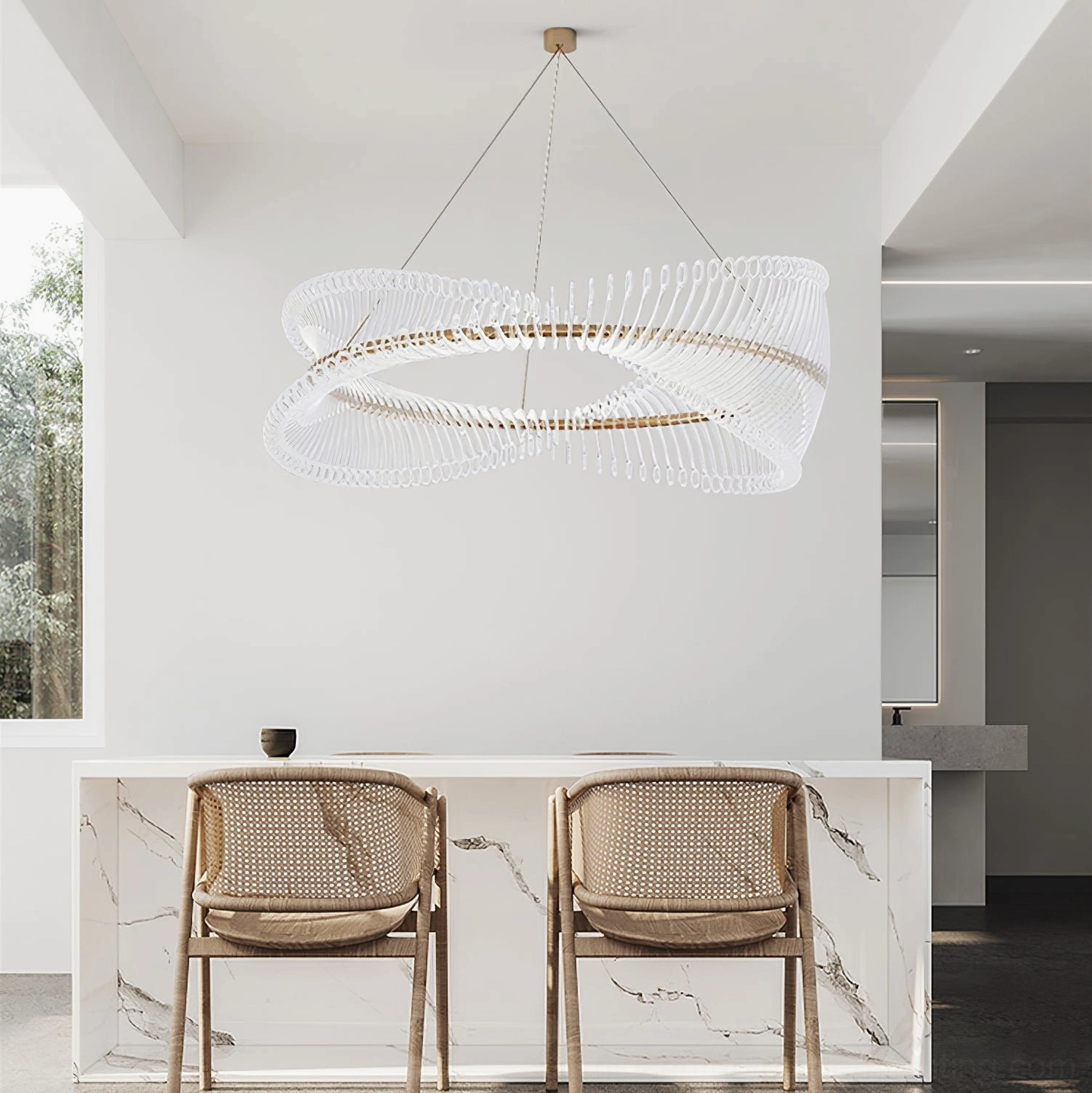Elegant Möbius gold chandelier with clear acrylic showing light diffusion and shadow interplay detail