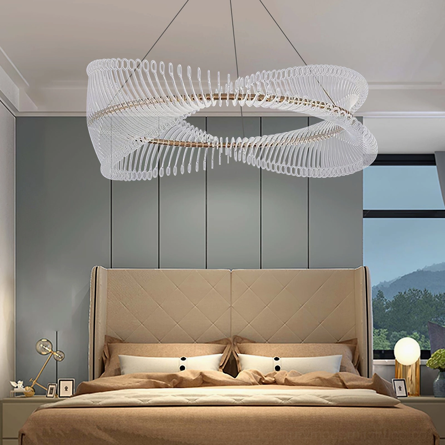 Elegant Möbius strip gold chandelier in luxury bedroom setting above tufted headboard with warm ambient glow