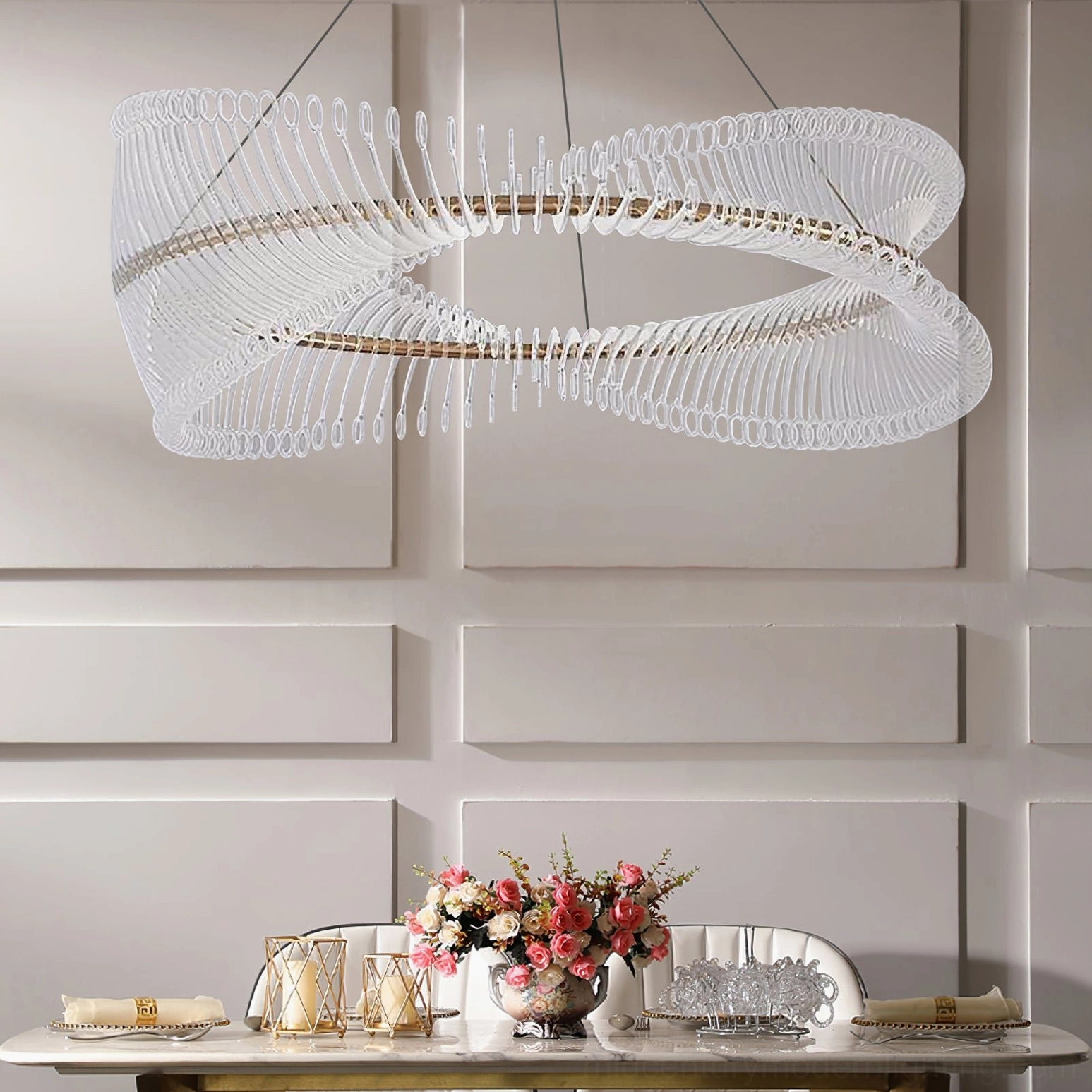 Sophisticated Möbius gold chandelier in minimalist modern interior with neutral palette and luxe styling