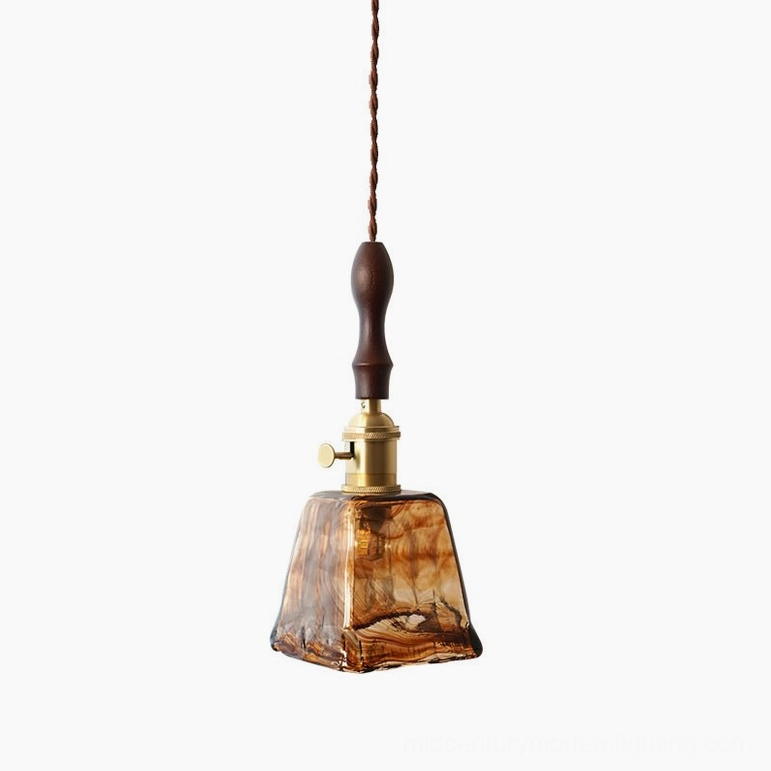 Model B compact amber glass pendant lamp with organic curves, walnut wood and brass accents