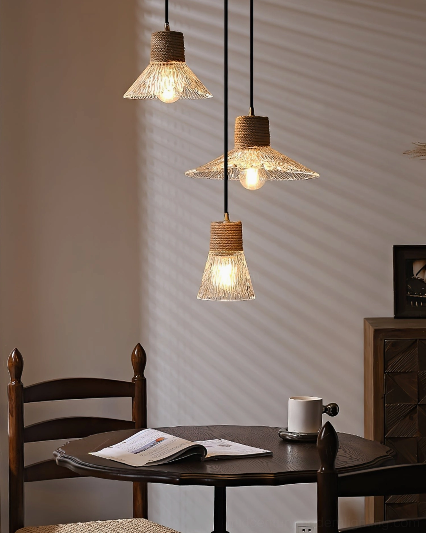 Model B size hemp rope glass pendant lamp hanging in bedroom setting, intimate warm ambient lighting fixture