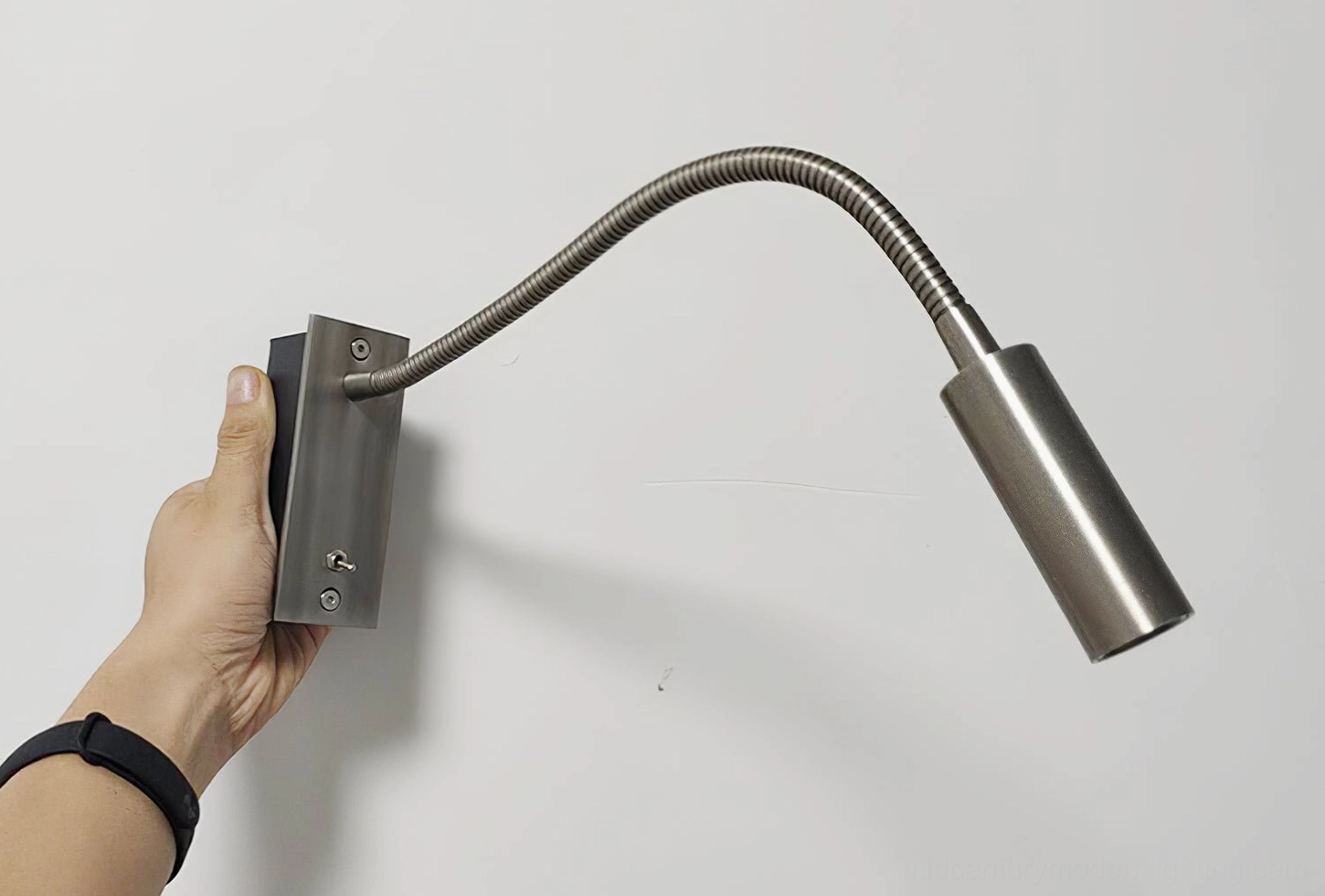 Modern art deco wall sconce LED light, flexible arm positioning demonstration