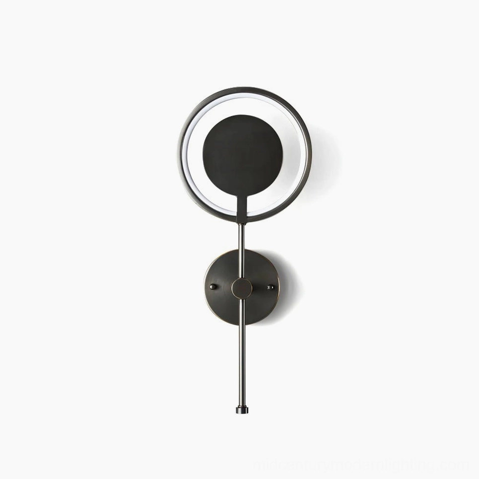 Modern black ring LED wall lamp with dual concentric circles, front view on studio background showcasing minimalist design