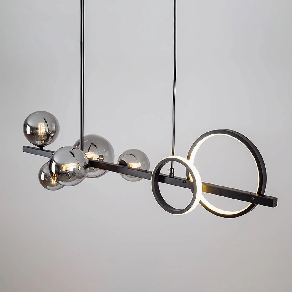 Modern glass bubble chandelier with black metal construction and frosted glass orbs in minimalist interior design setting