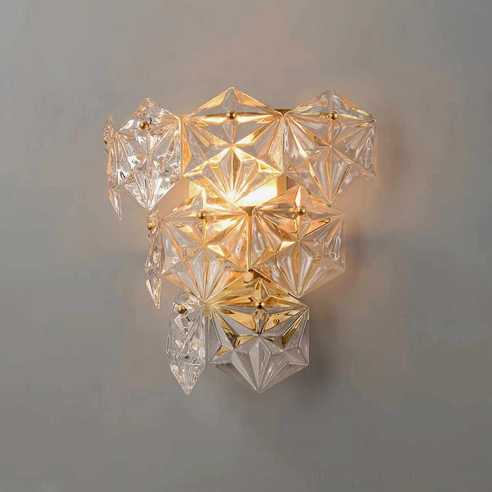 Modern luxury crystal wall lamp with geometric faceted glass and warm soft illumination