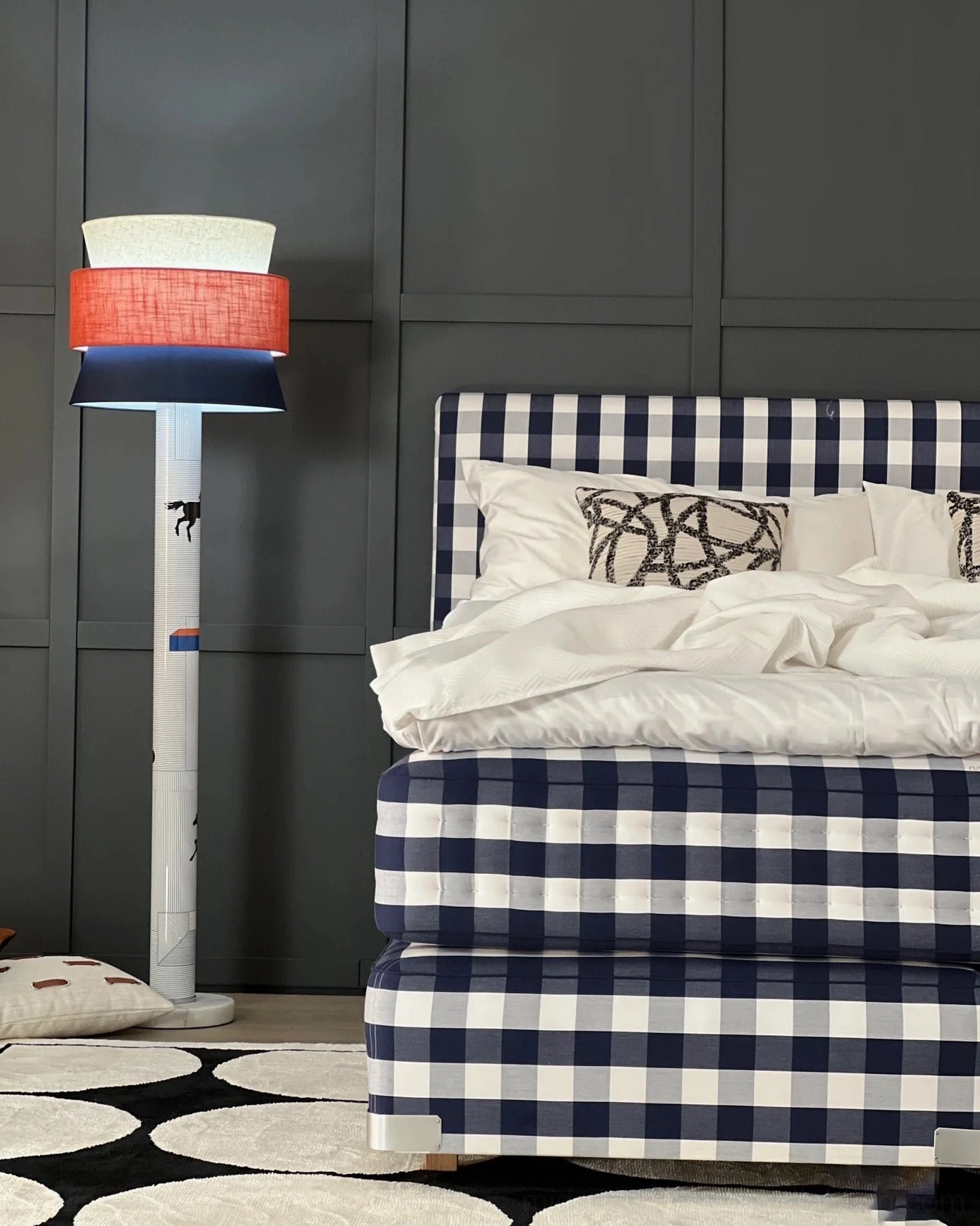 Modern playful floor lamp with printed pony motif on metal pole and warm ambient light from layered linen shade