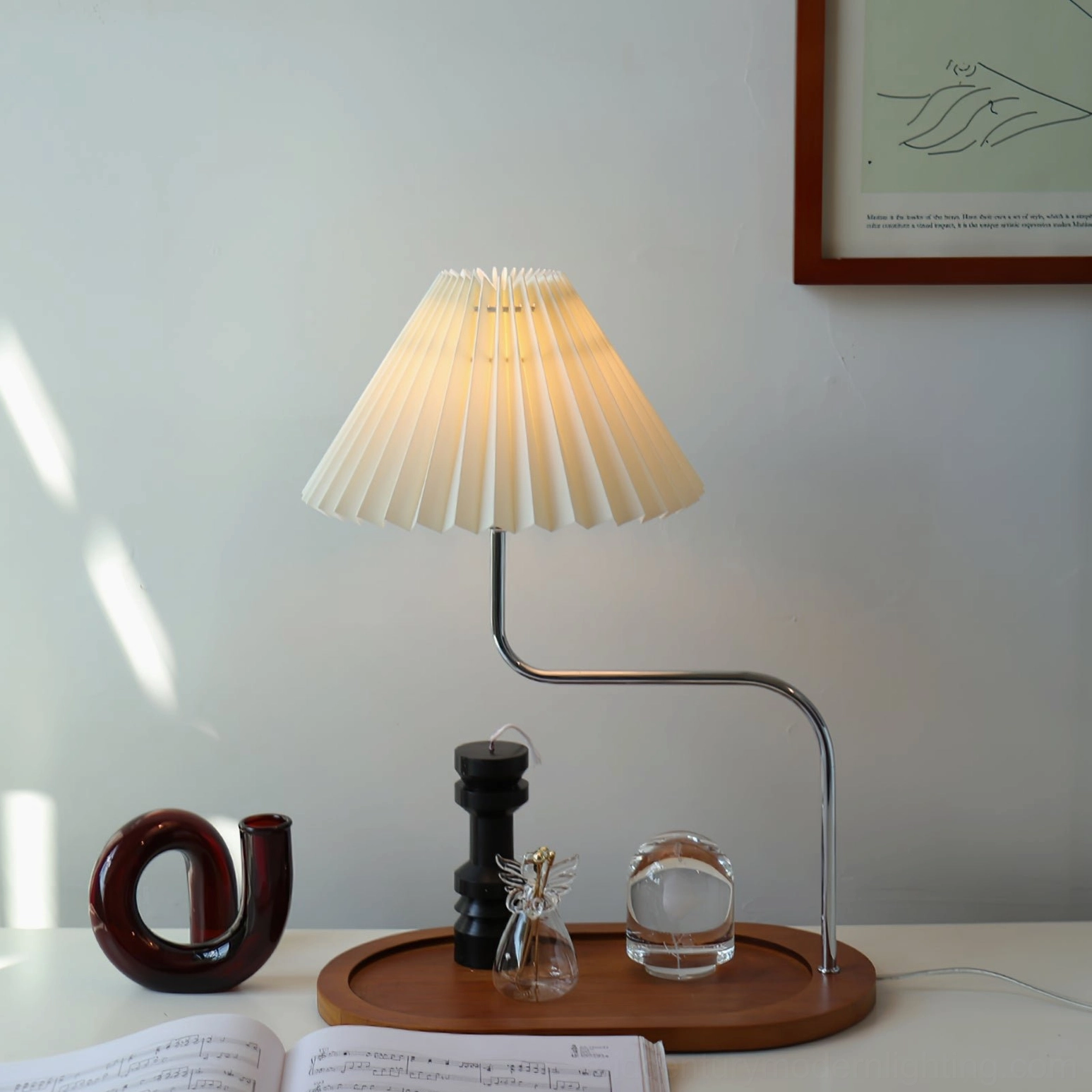 Modern pleated table lamp accent lighting in home interior design setting