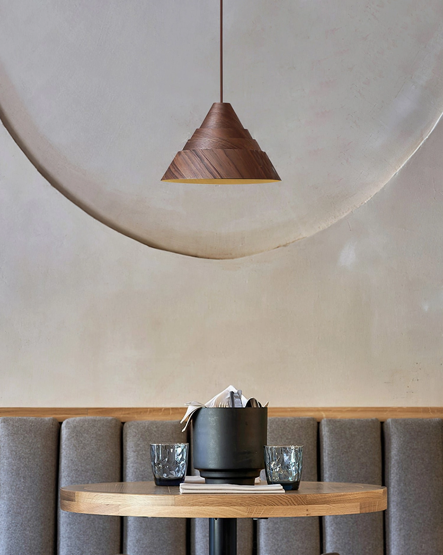 Moku wooden pendant light with mid-century modern tapered silhouette in contemporary home setting