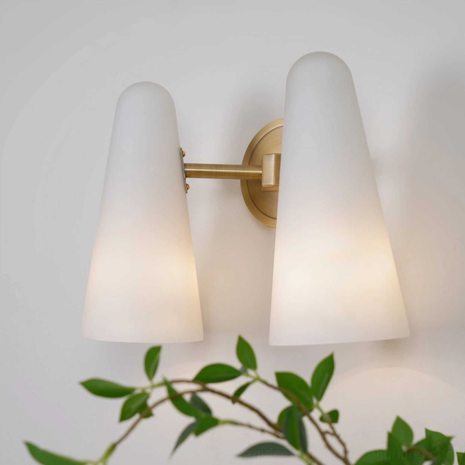 Montfaucon minimalist wall sconce in contemporary interior showing architectural simplicity and light diffusion