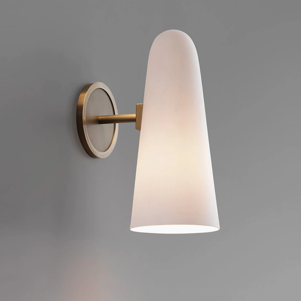Montfaucon wall sconce side profile view showing slim brass mounting bracket and frosted white glass shade