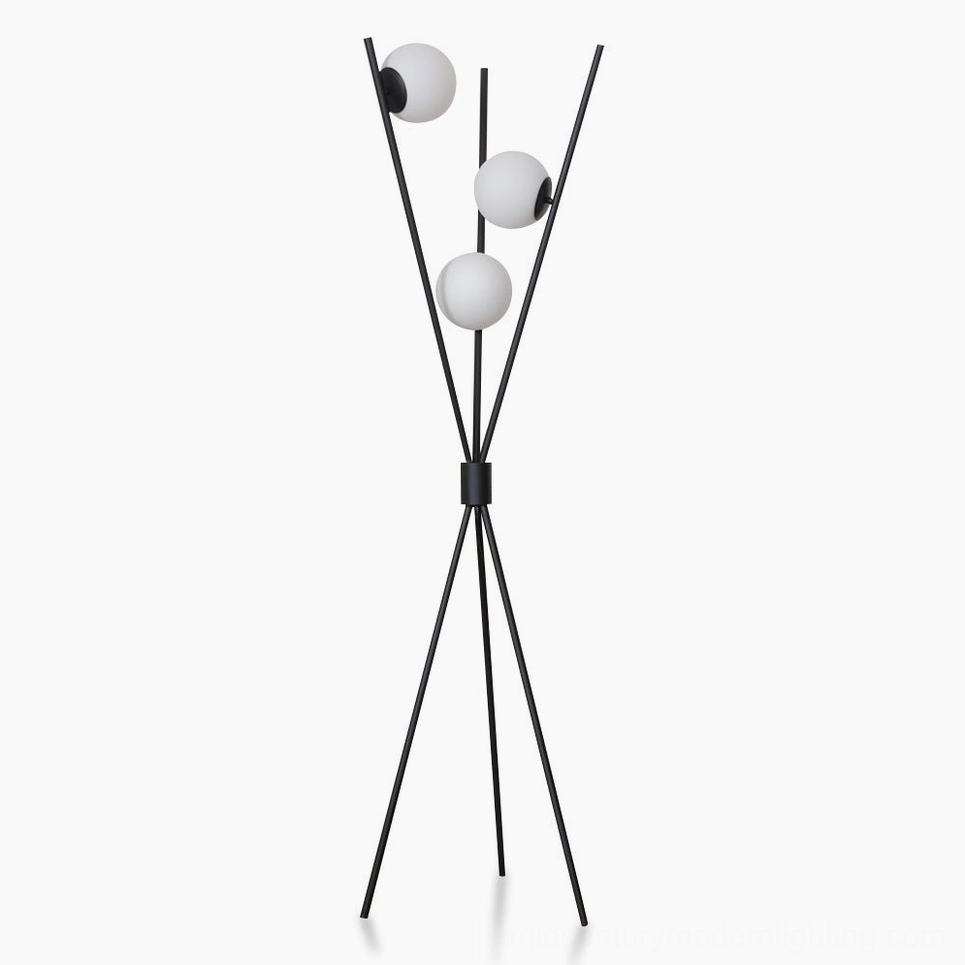 Moon Tripod Floor Lamp with three frosted white glass globes on matte black metal stand, front view