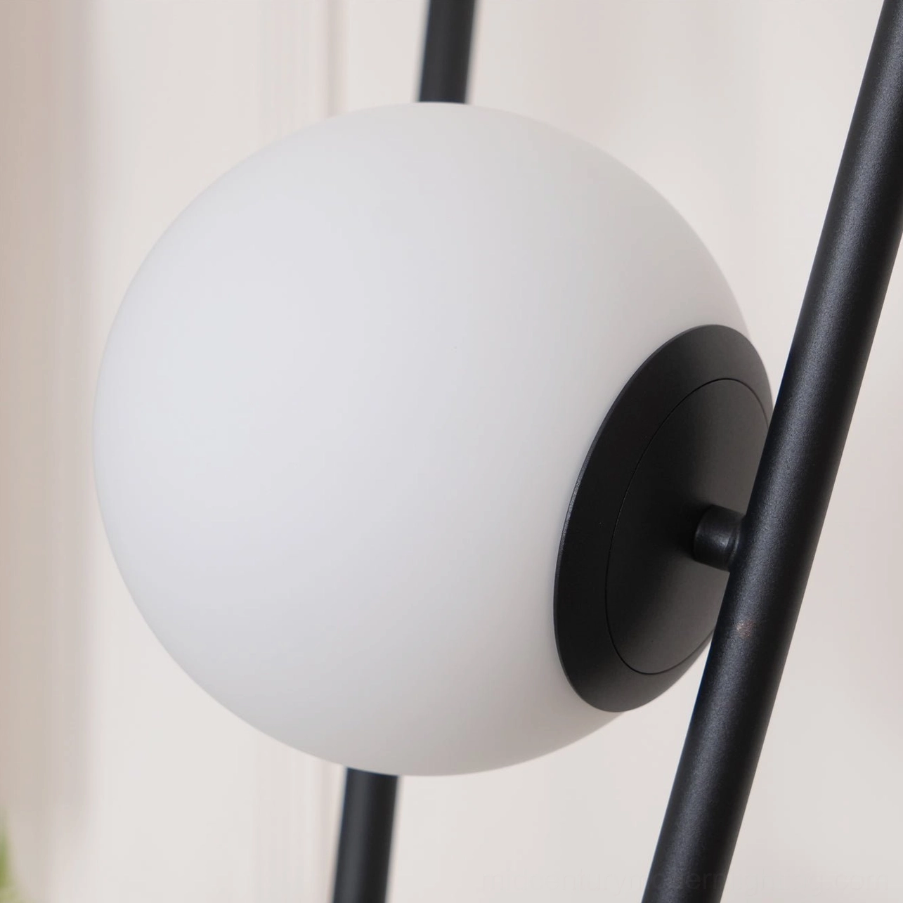 Moon Tripod Floor Lamp lifestyle shot demonstrating ambient lighting and interior design integration