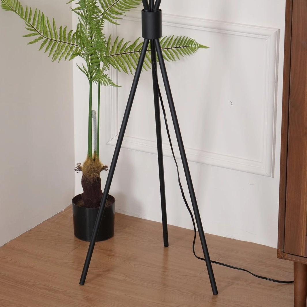 Moon Tripod Floor Lamp mid-century modern design with geometric black metal frame and frosted globes