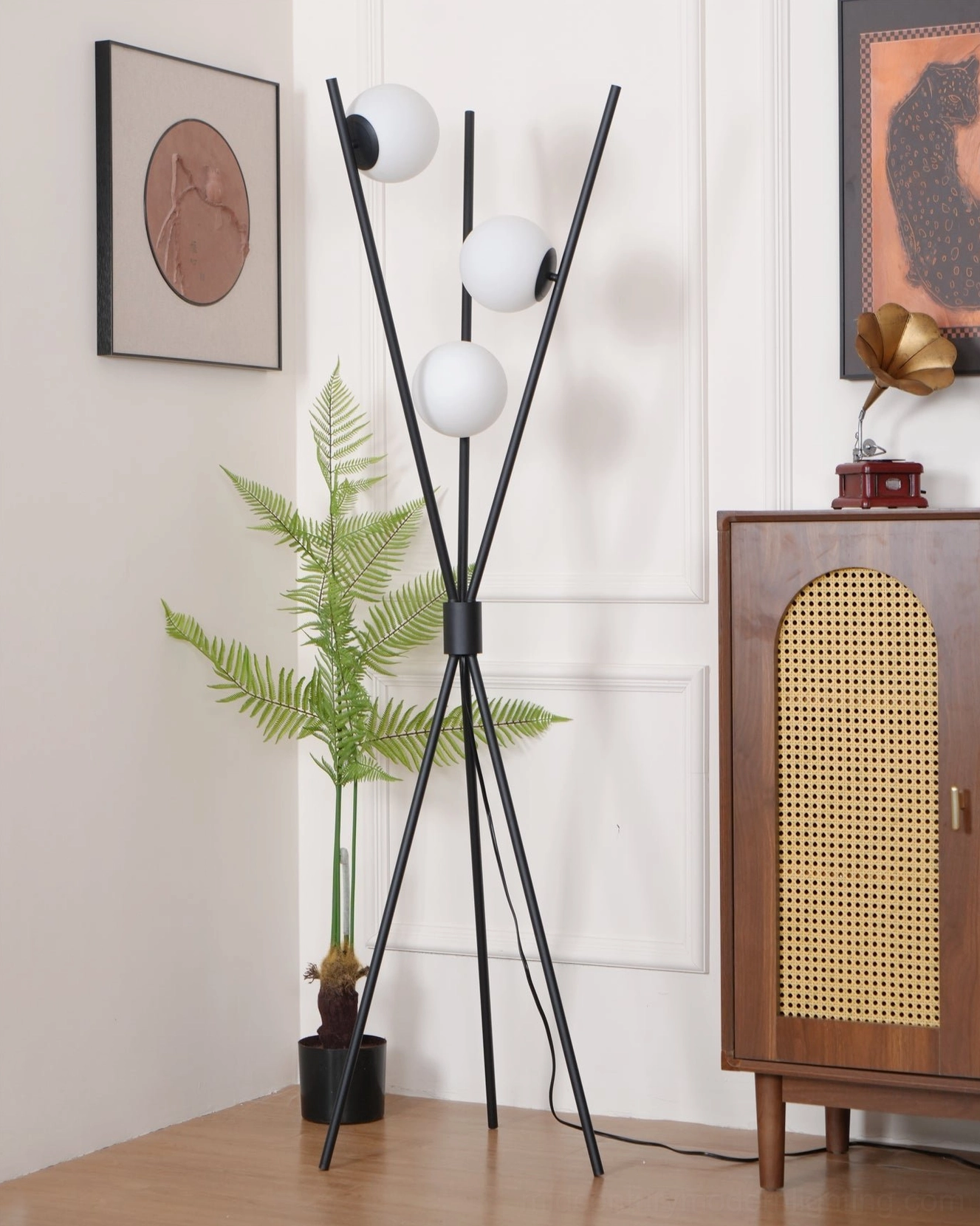 Moon Floor Lamp positioned in retro home decor area beside vintage wall art and wooden furniture