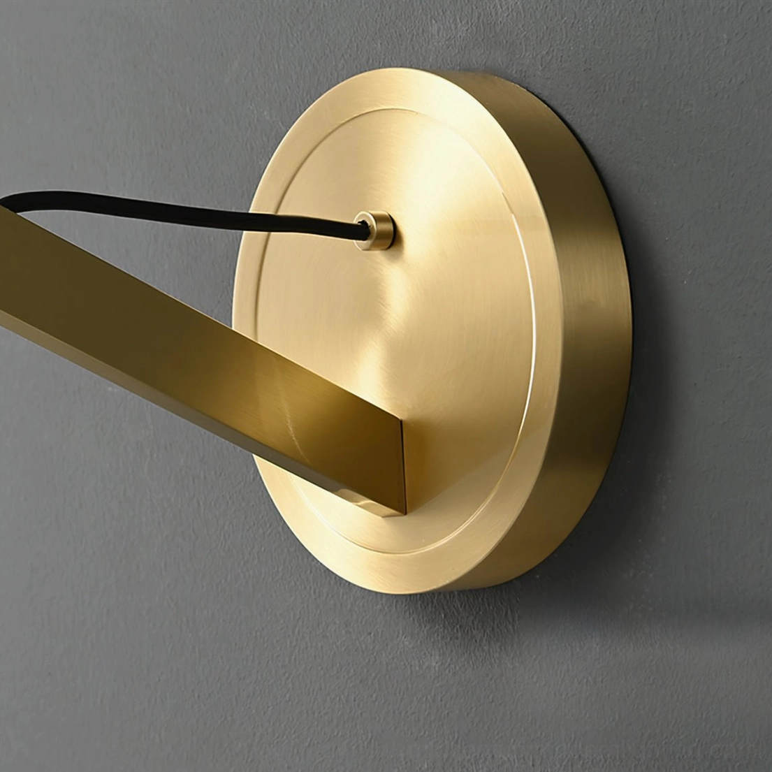 Mullan minimalist wall sconce mounted in mid-century modern interior design setting