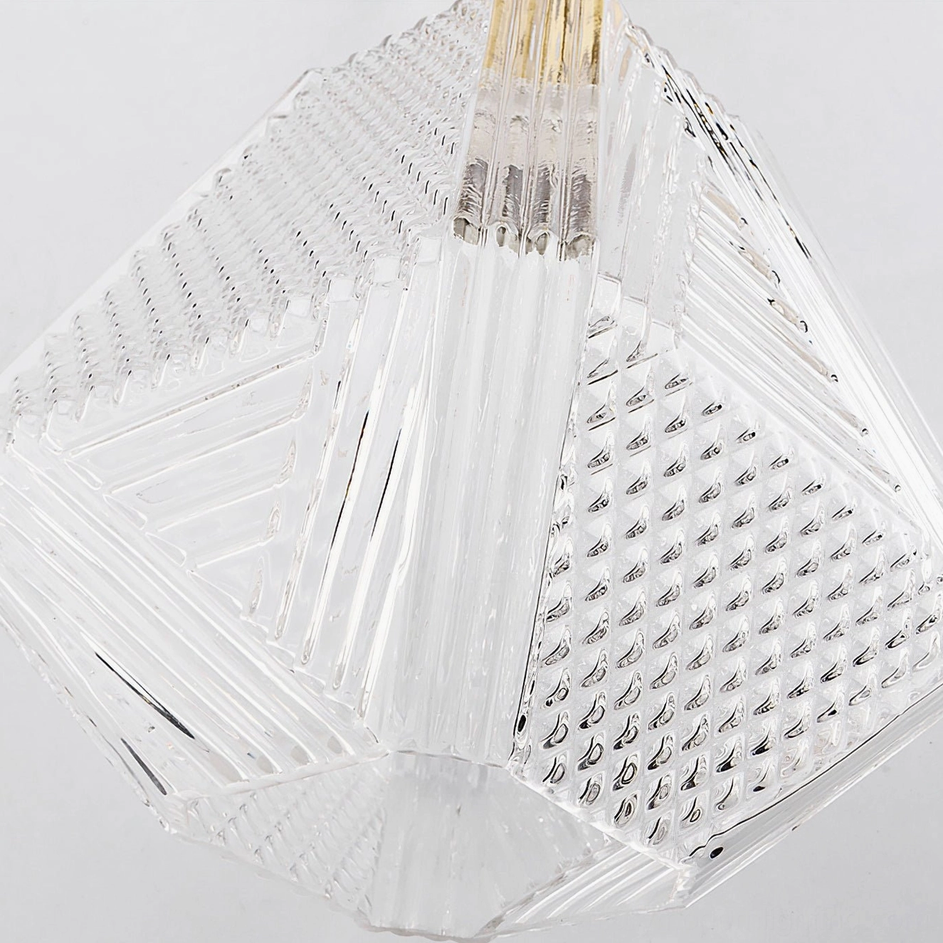 Multiple Art Deco diamond cut ceiling lights linear arrangement dining area