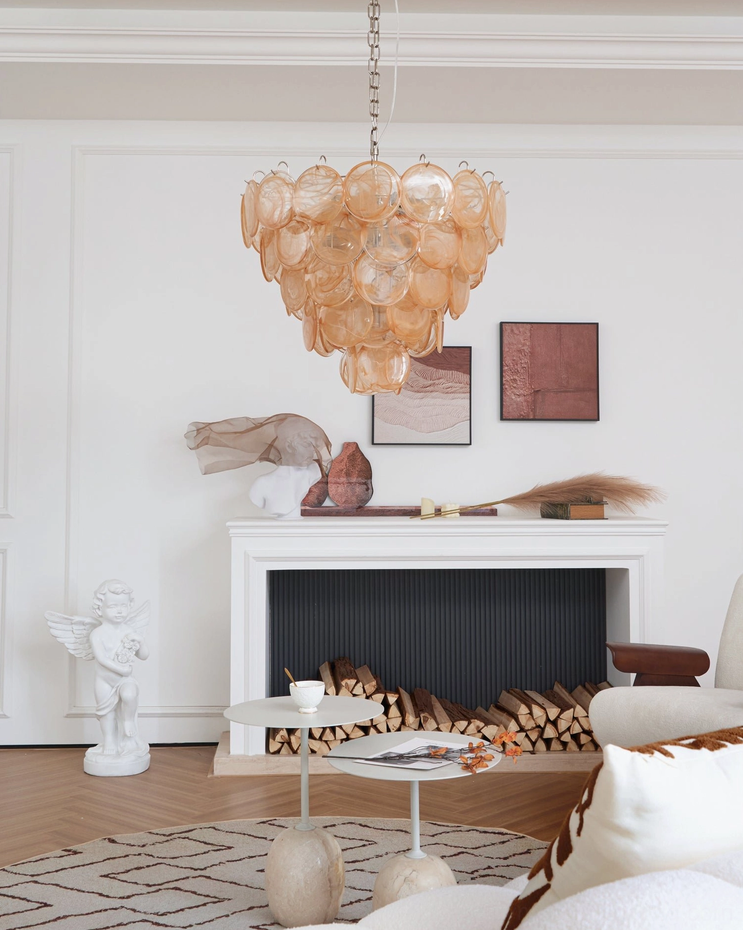 Murano caramel disc chandelier in warm classic neutral living room interior with decorative accents