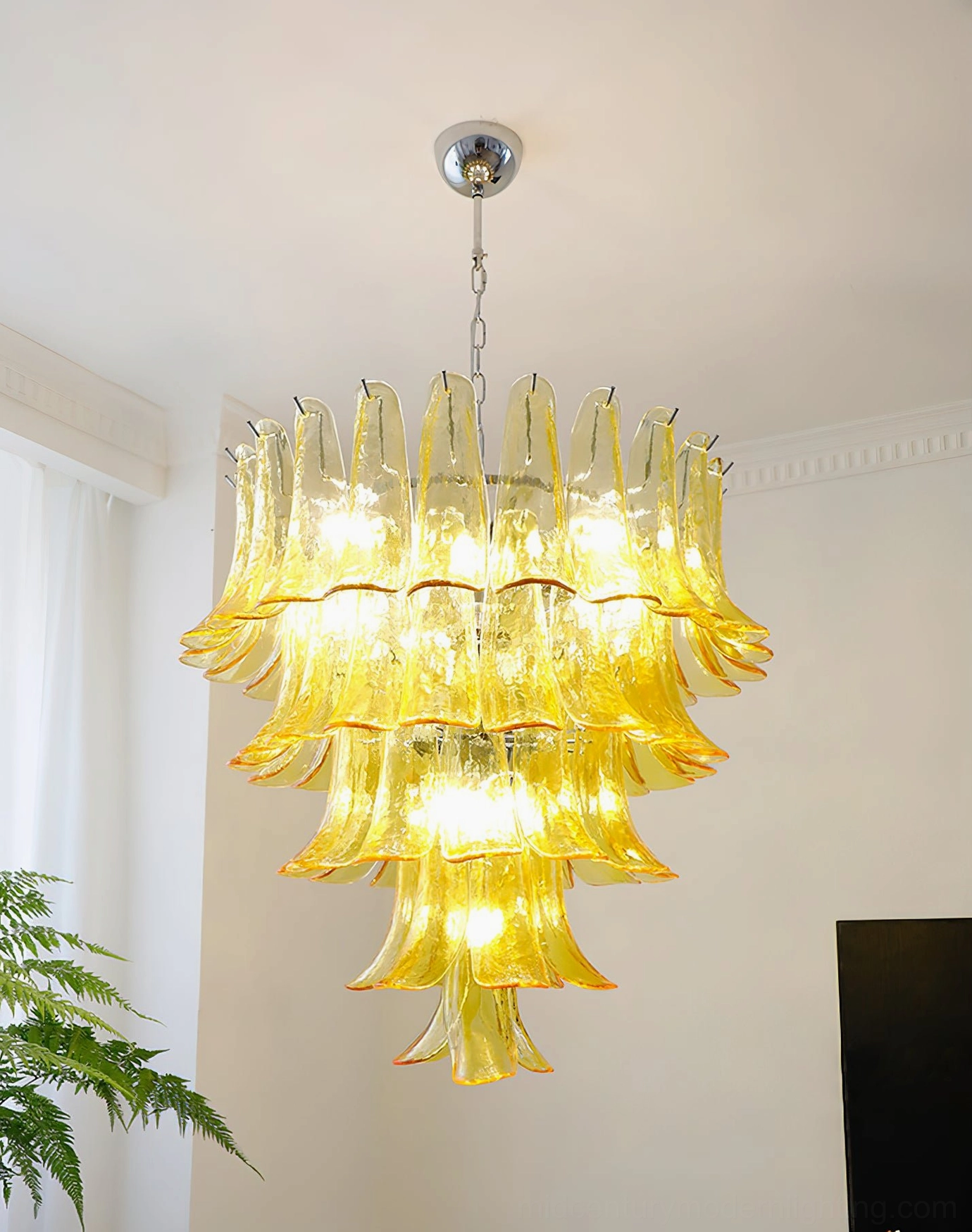 Murano glass chandelier amber tones residential dining room installation