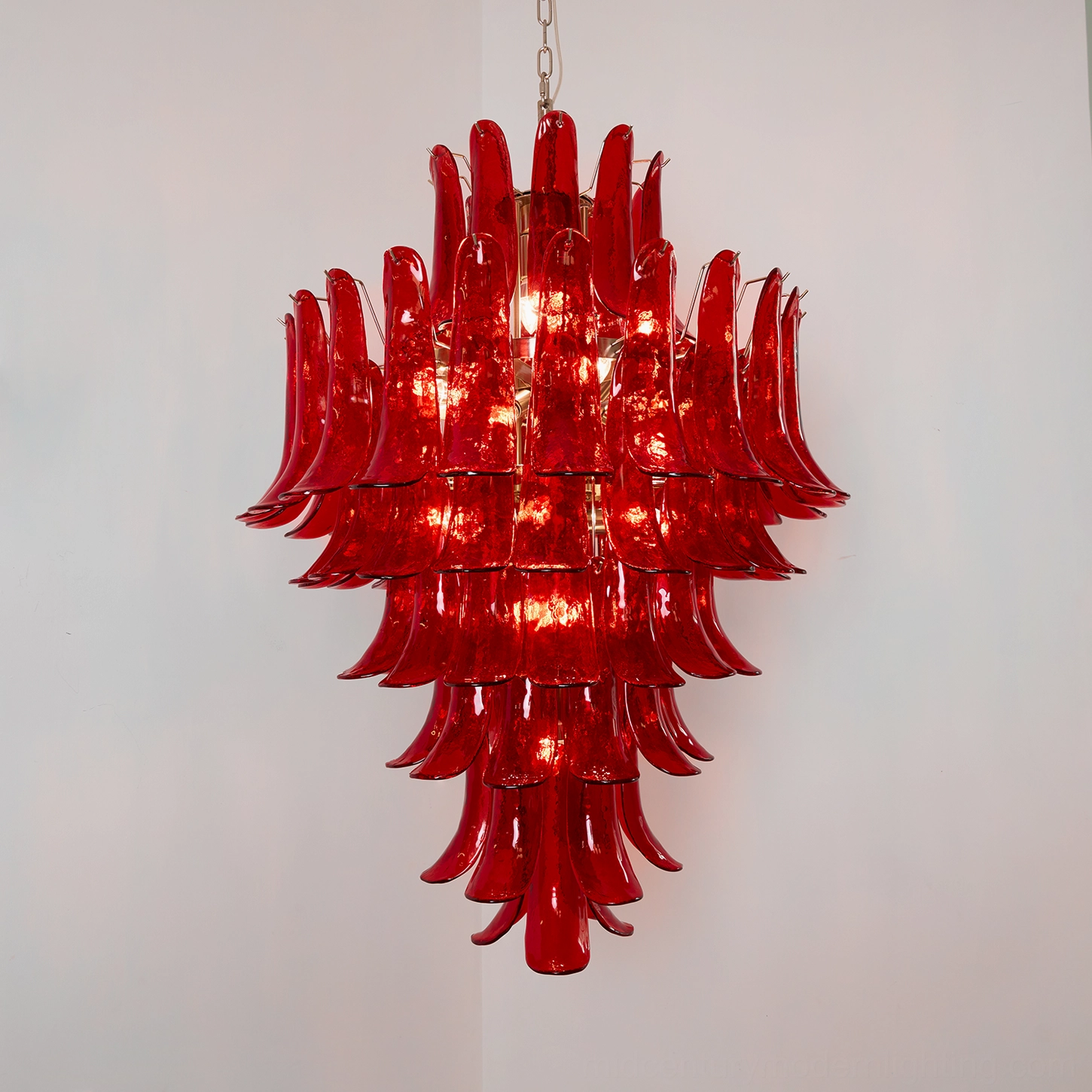 Overhead perspective of hand-blown Murano glass chandelier revealing full petal cascade composition and internal bulb configuration
