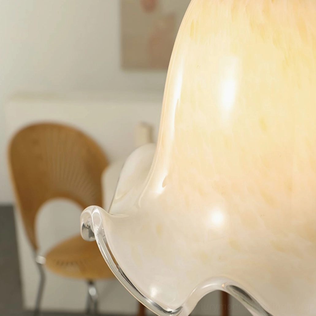 Close-up detail of murano glass lampshade showing handcrafted ruffled texture and warm cream tone