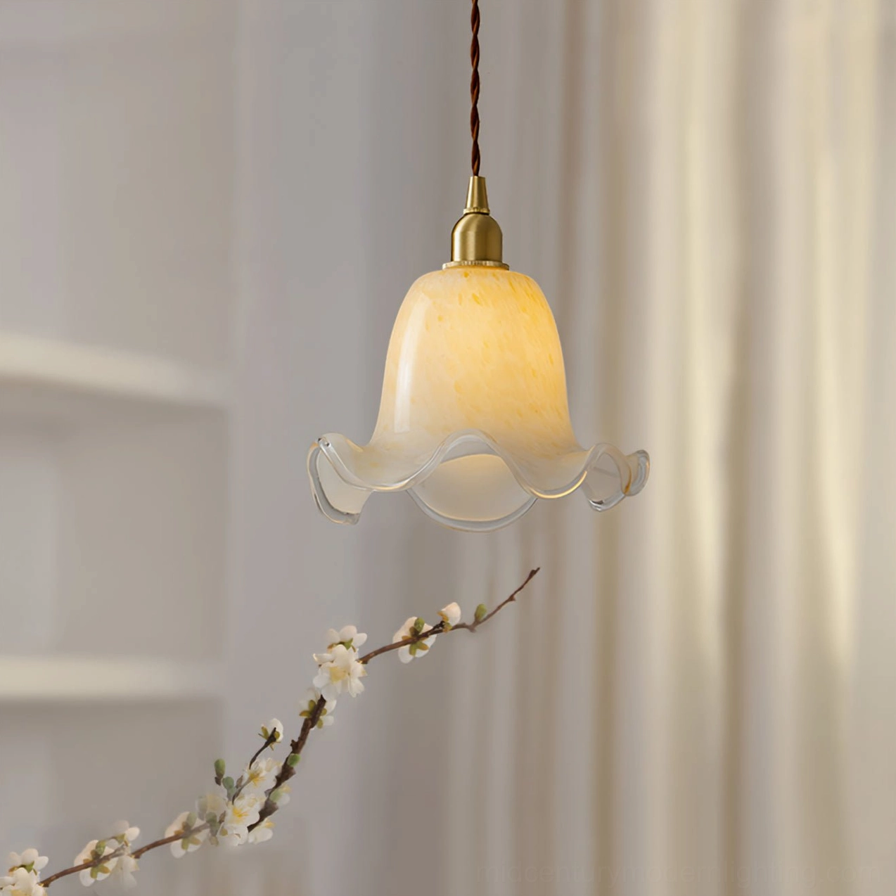 Handcrafted murano glass pendant lamp creating warm ambient light in dining area setting