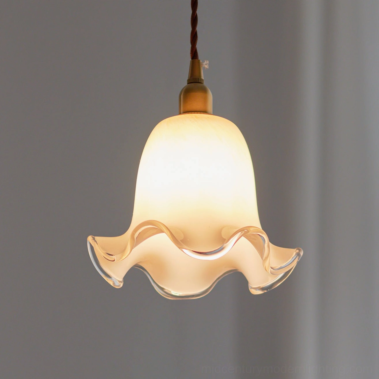 Handcrafted murano glass pendant lamp with adjustable cord and brass ceiling mount hardware