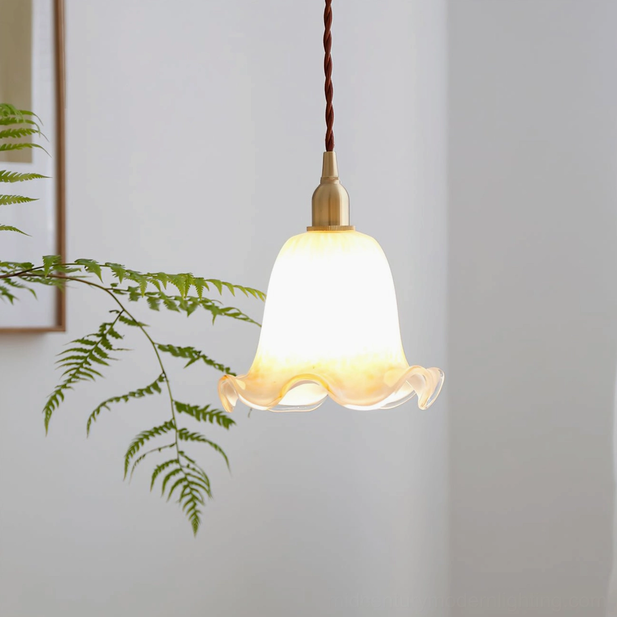Murano glass pendant light installed in cozy living corner with vintage decor and warm ambient lighting