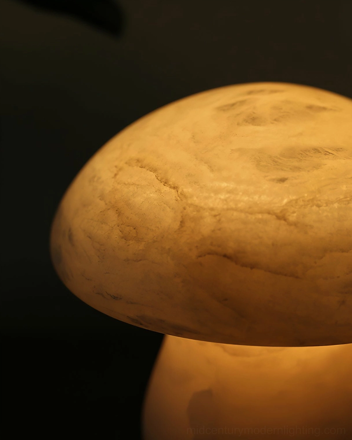 Elegant mushroom alabaster table lamp glowing softly on bedside table creating calm sanctuary lighting environment