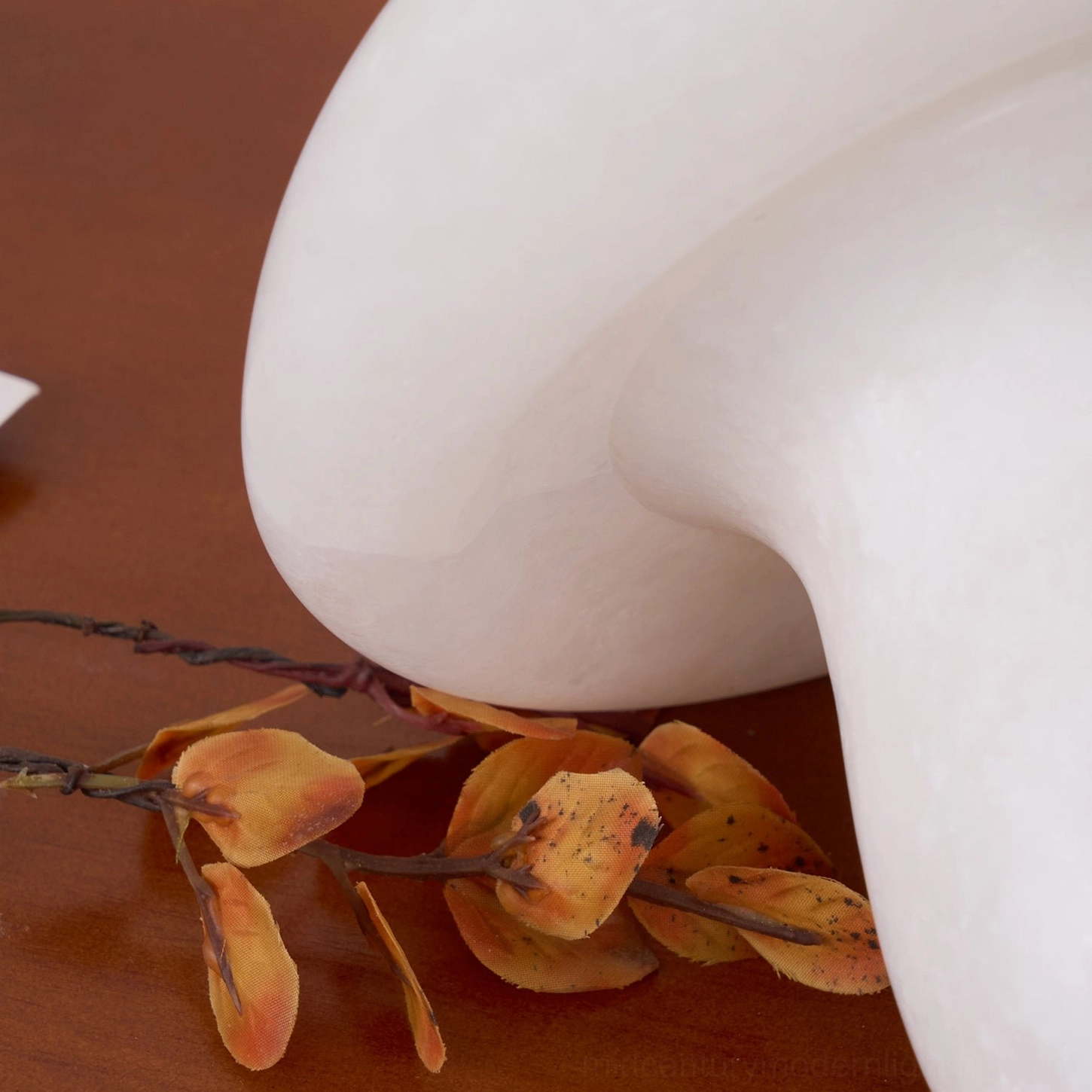 Statement size mushroom alabaster table lamp creating sculptural focal point with warm diffused light in modern home