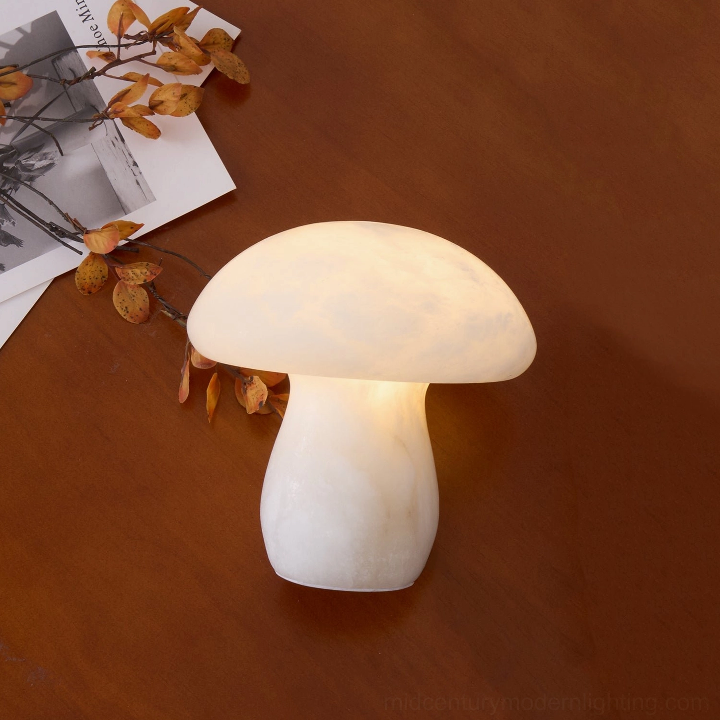 Mushroom shaped alabaster ambient lighting lamp with translucent natural stone material and Scandinavian design influence