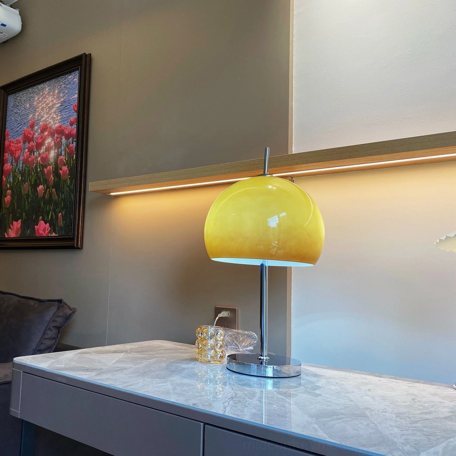 Mid-century modern mushroom table lamp with gradient shade in gallery-style retail space