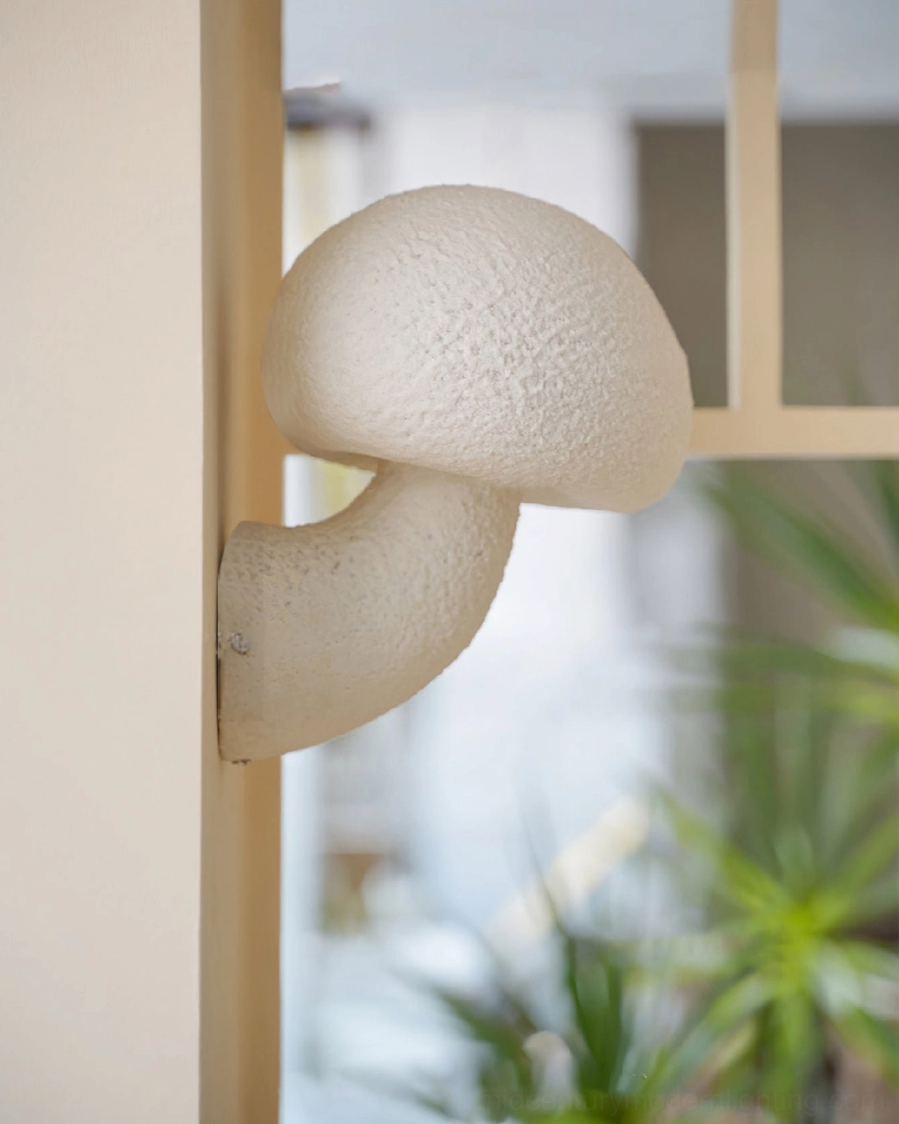 Mushroom resin wall lamp mounted on interior wall space - contemporary ambient lighting design