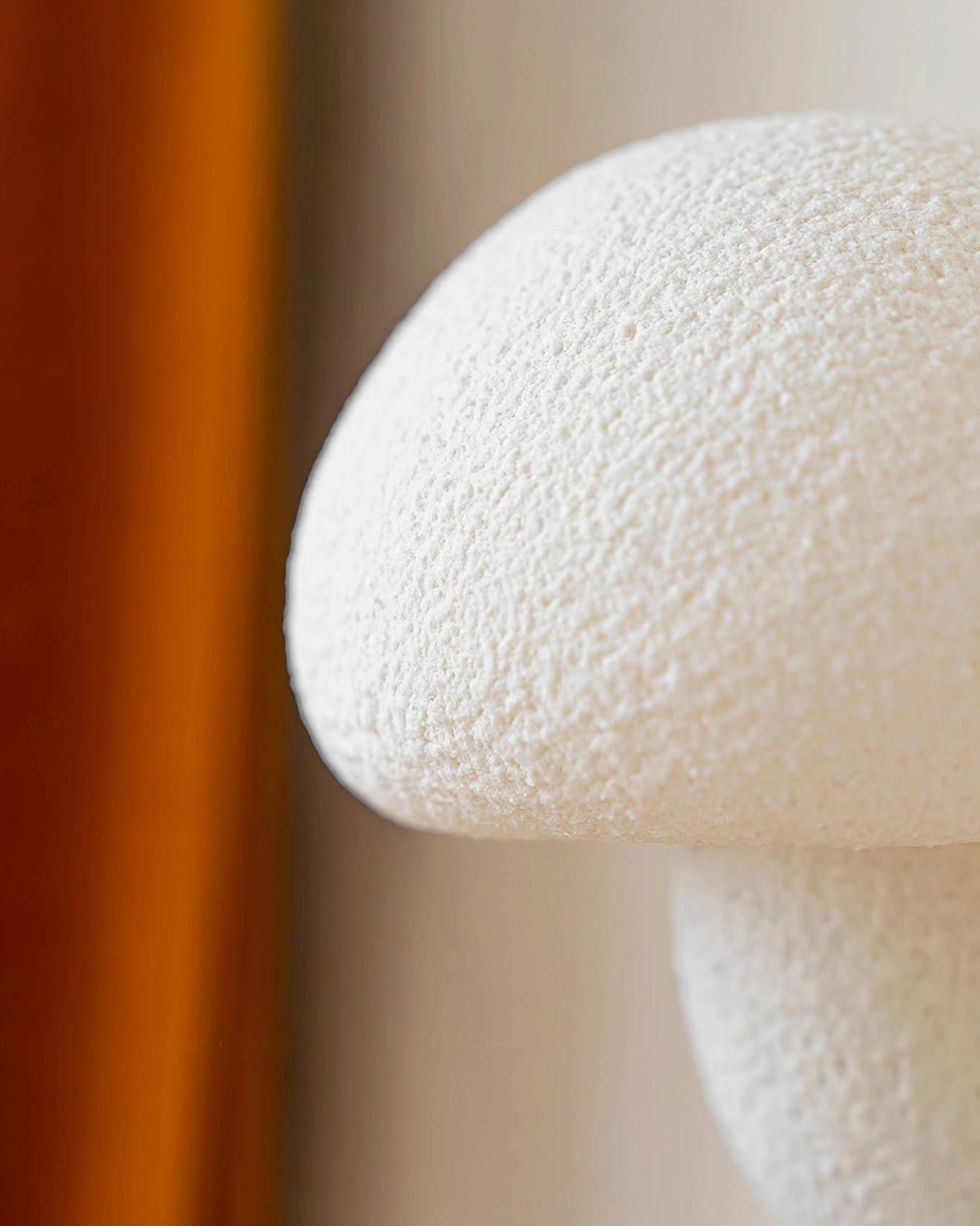Mushroom resin wall lamp close-up showing bumpy matte textured surface - organic casting finish detail