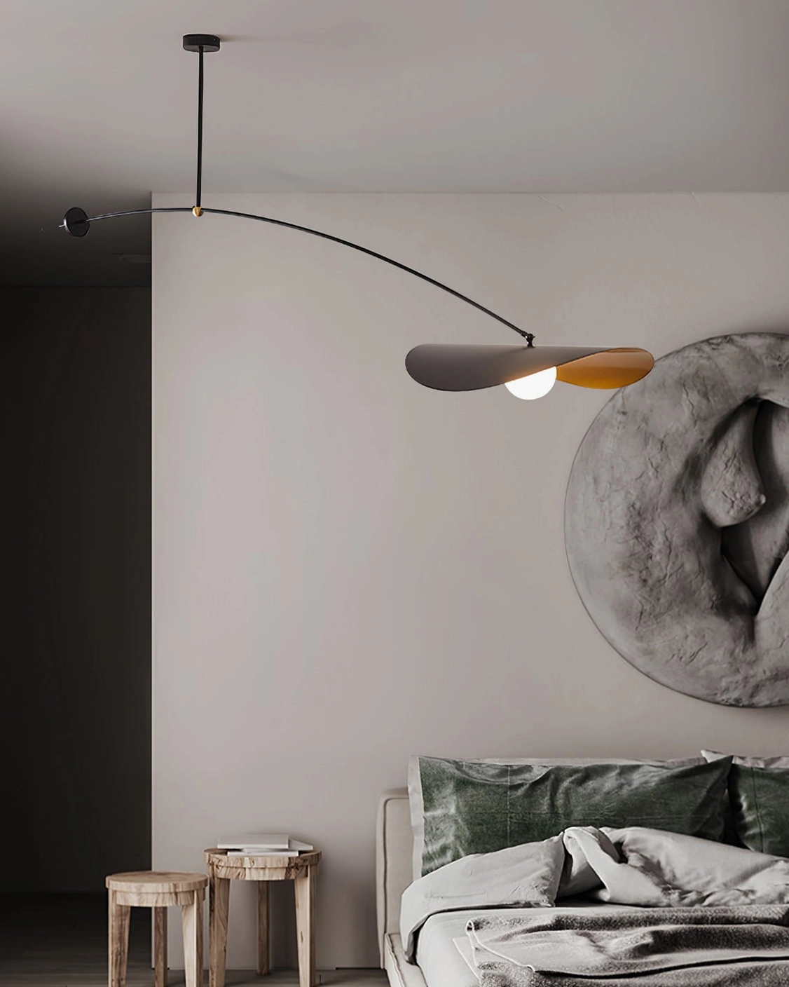 Myrna articulating ceiling light in modern bedroom with bed and wall decor, minimalist lighting solution