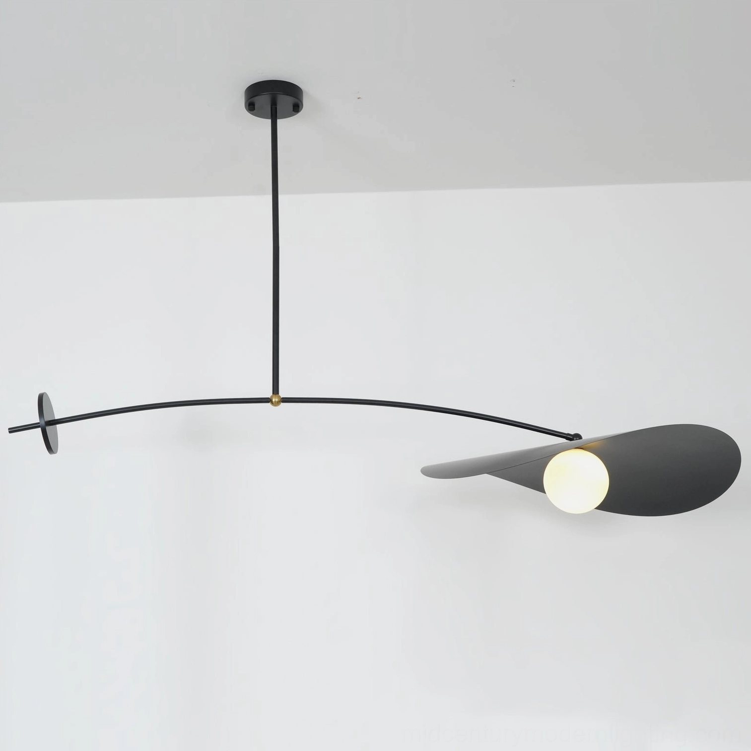 Myrna adjustable arc ceiling pendant in mid-century modern interior design setting