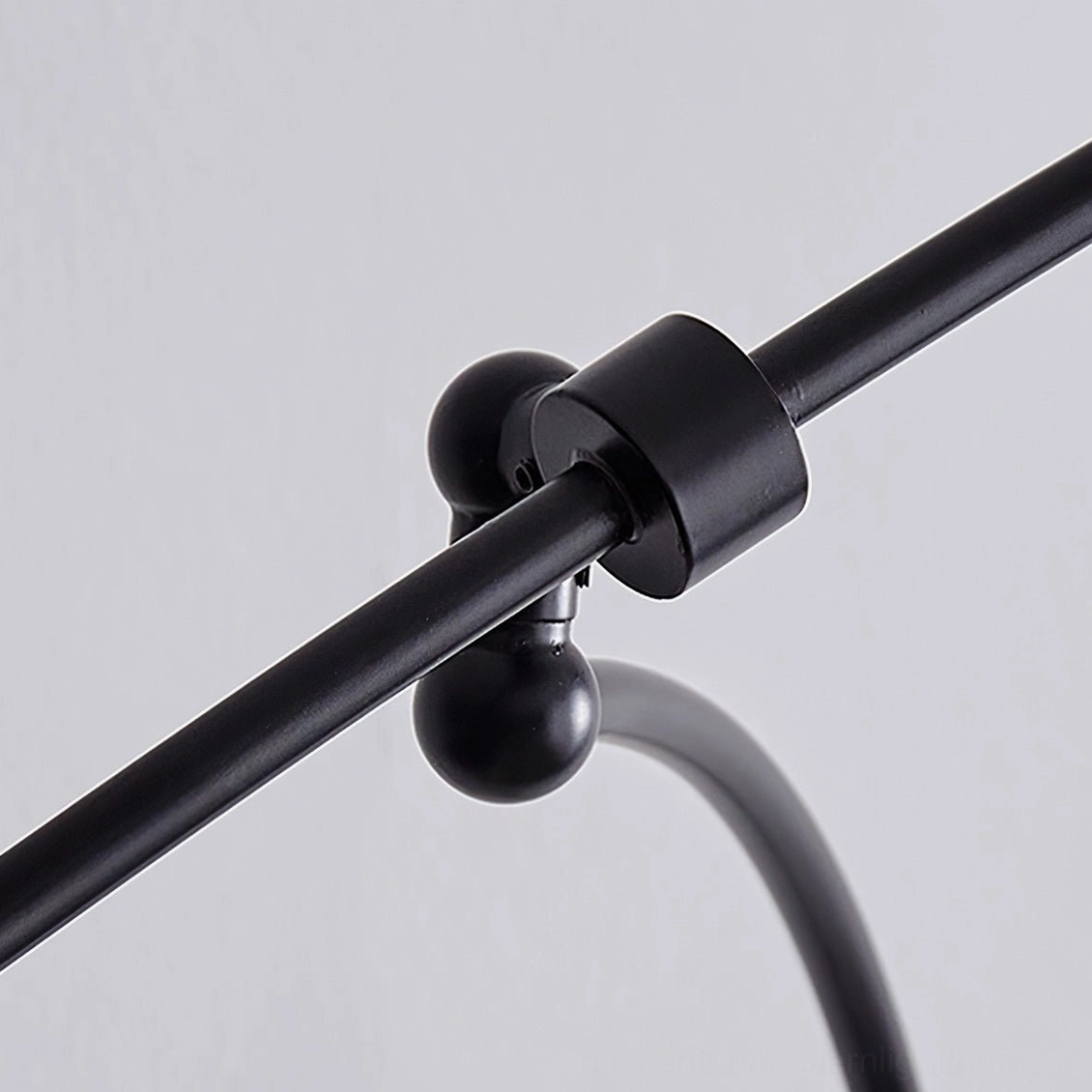 Myrna adjustable counterweight ceiling pendant, detailed close-up of articulating arm mechanism