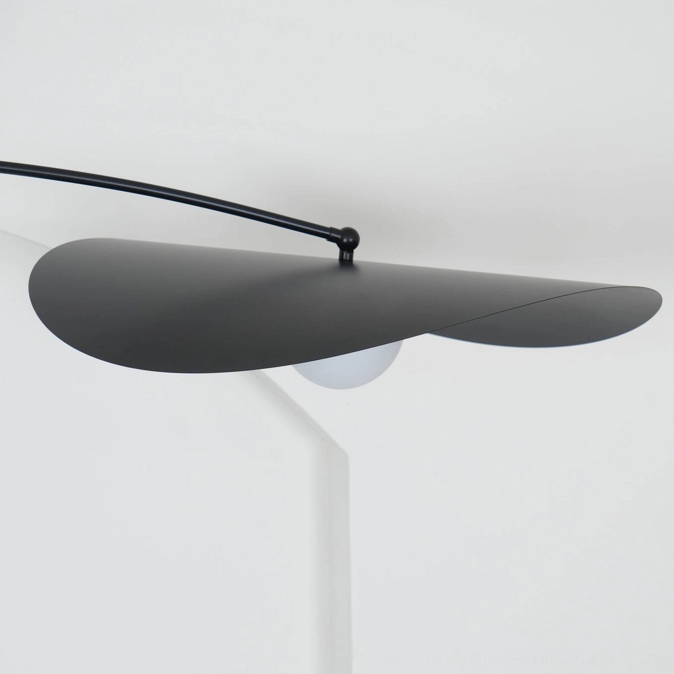 Myrna counterweight ceiling light showing articulating arm in active position