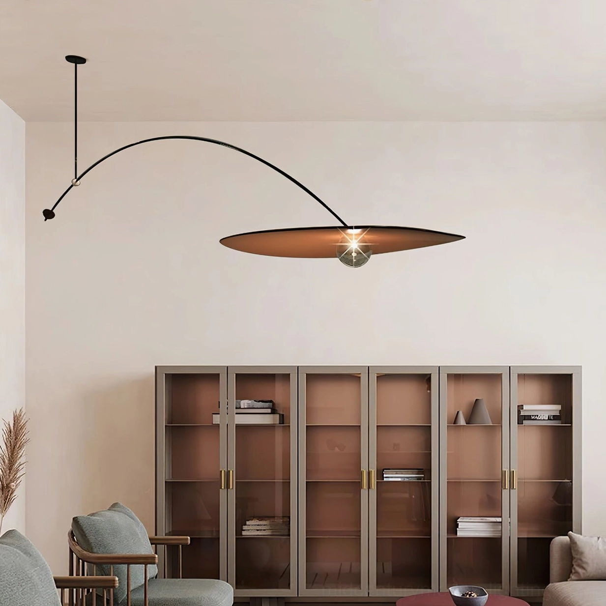 Myrna ceiling pendant with perforated shade and handblown glass globe, lighting diffusion detail