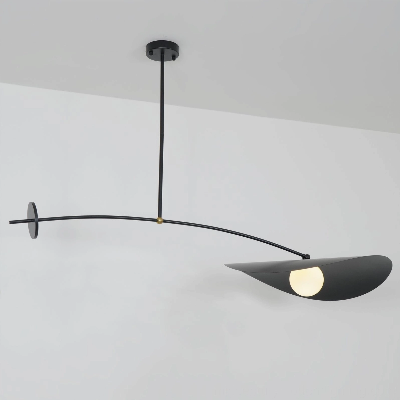 Myrna counterweight pendant light showing sculptural metal frame and arm geometry