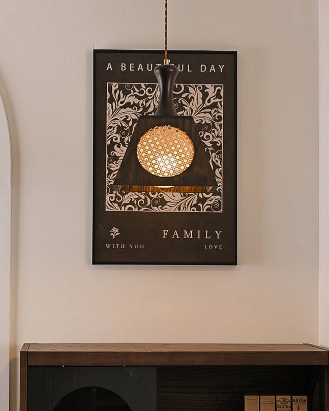 Mysore handwoven rattan pendant lamp detail shot showing brass canopy hardware and twisted cord assembly with walnut wood finish