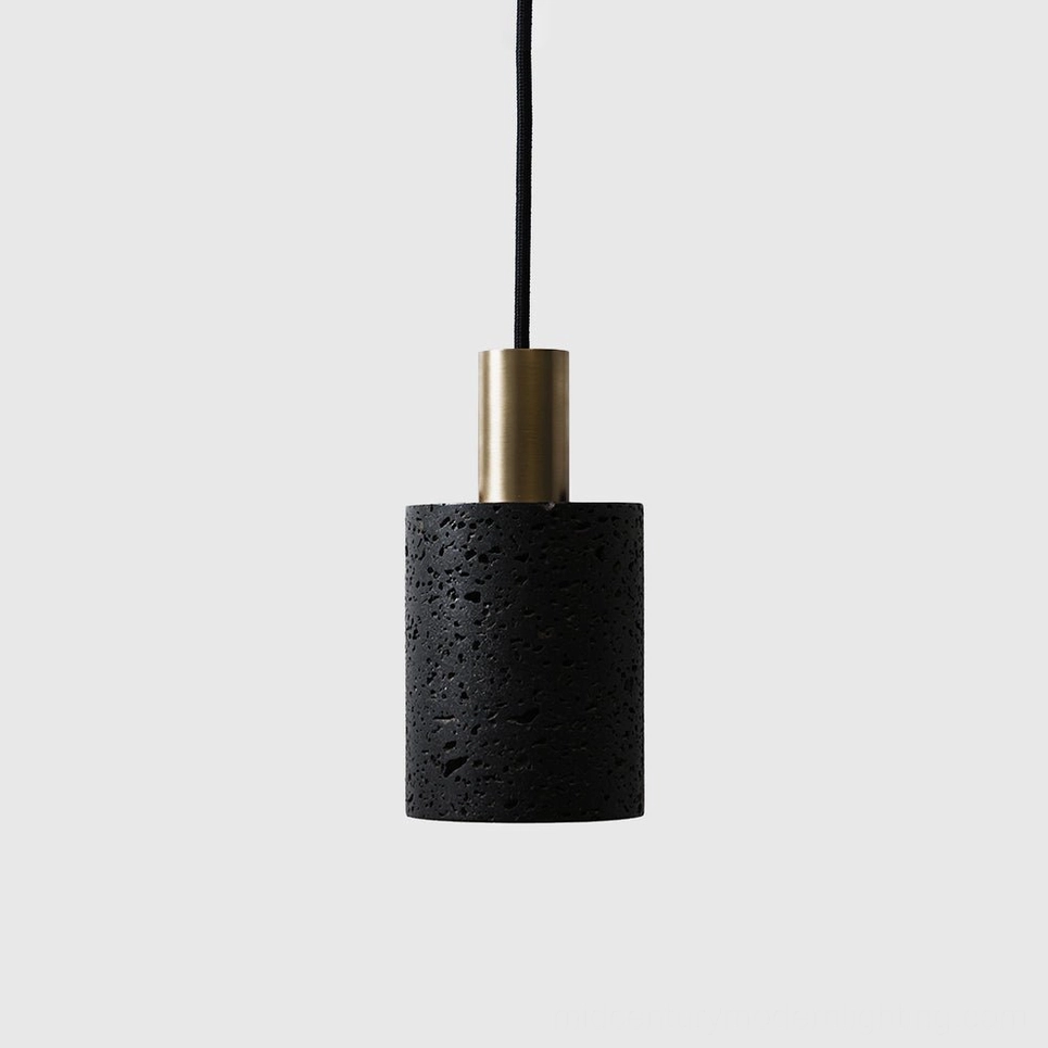 N Stone Pendant Lamp in Black & Gold variant featuring brushed brass metal accent and dark lava stone base