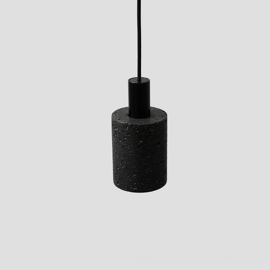 Compact single N Stone Pendant Lamp in minimalist scale with organic porous stone finish