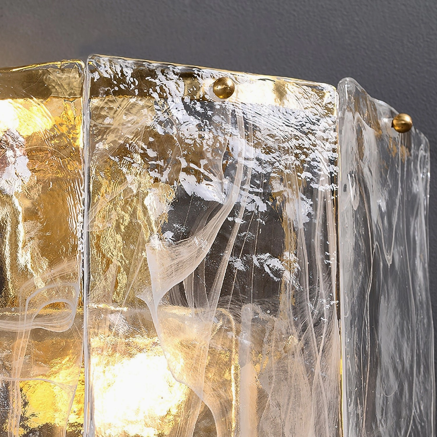 Nason brass wall sconce as architectural element in contemporary home styling with modern furniture arrangement