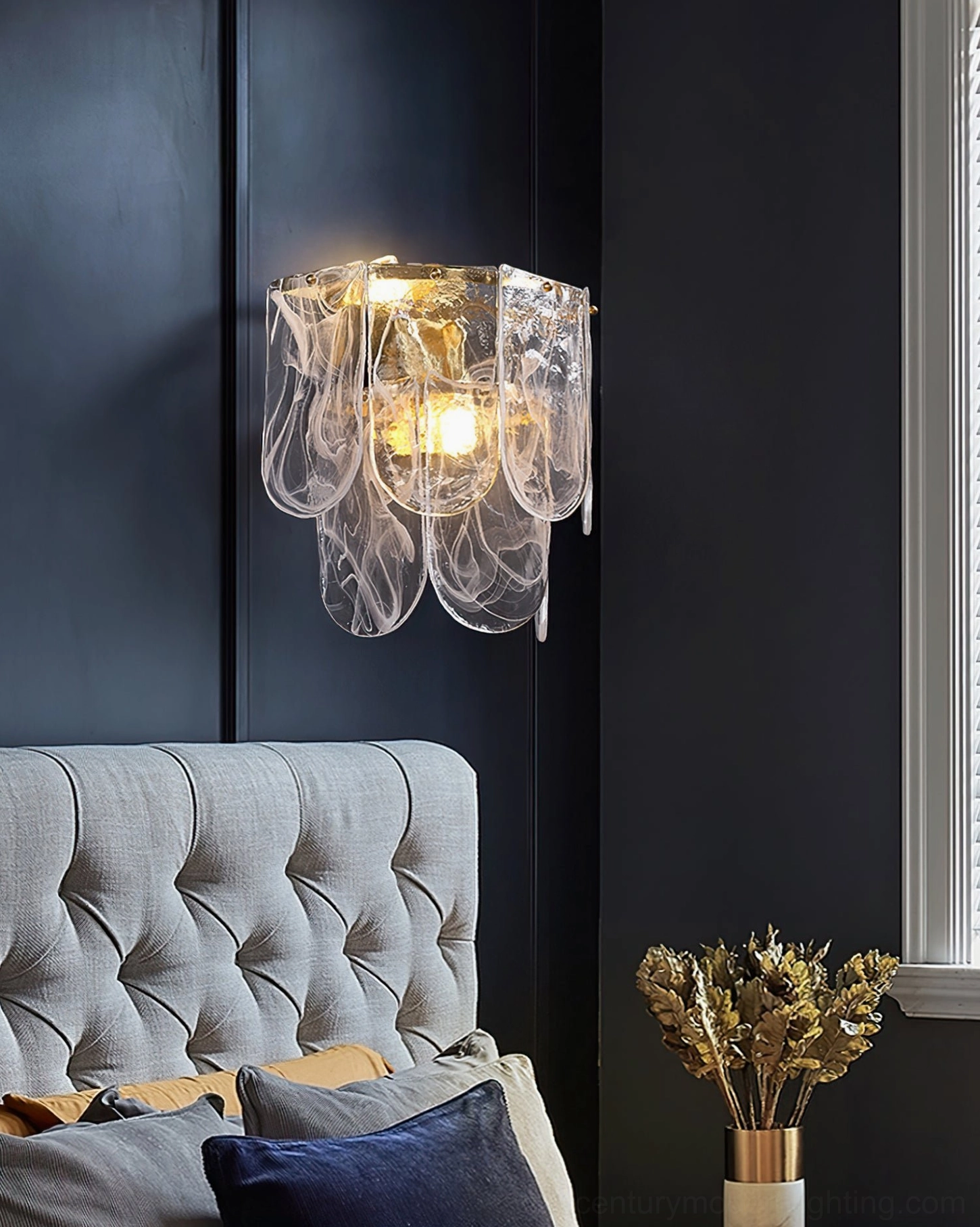 Nason brass wall sconce architectural installation detail showing brass mounting and glass shade construction